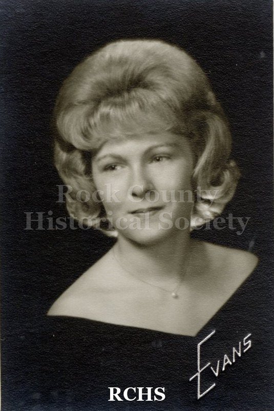 Black and white portrait of an unidentified young woman, Janesville High School graduate. Photo was from the personal collection of Bruce Bell, JHS class of 1965.