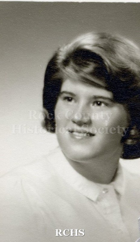 Black and white portrait of an unidentified young woman, Janesville High School graduate. Photo was from the personal collection of Bruce Bell, JHS class of 1965.