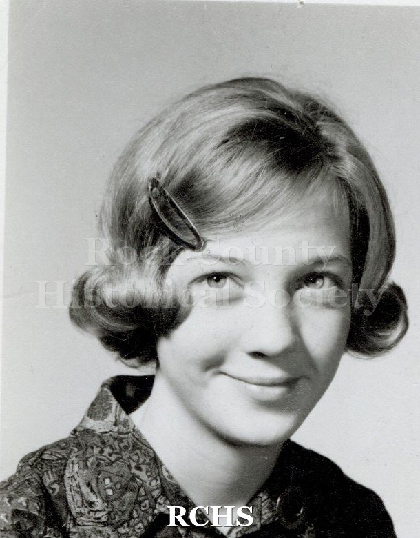 Black and white portrait of an unidentified young woman, Janesville High School graduate. Photo was from the personal collection of Bruce Bell, JHS class of 1965.