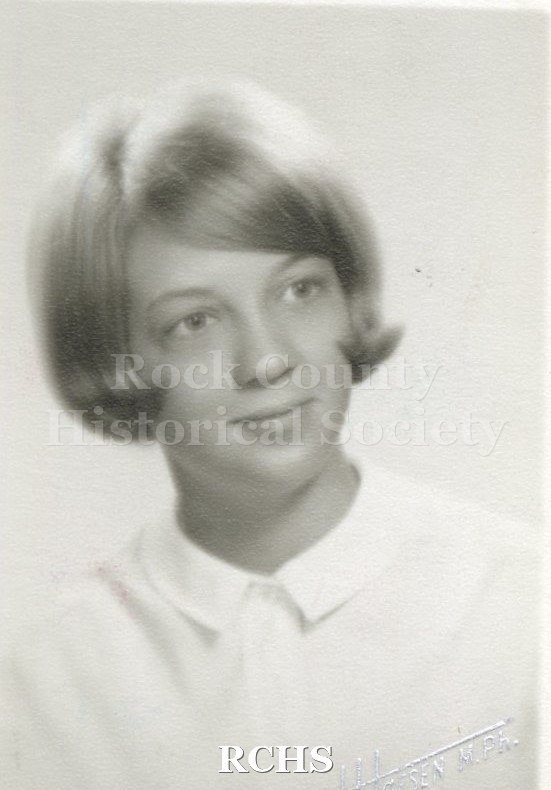 Black and white portrait of an unidentified young woman, Janesville High School graduate. Photo was from the personal collection of Bruce Bell, JHS class of 1965.