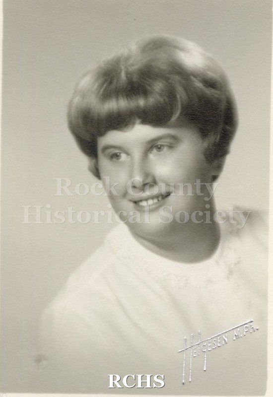 Black and white portrait of an unidentified young woman, Janesville High School graduate. Photo was from the personal collection of Bruce Bell, JHS class of 1965.
