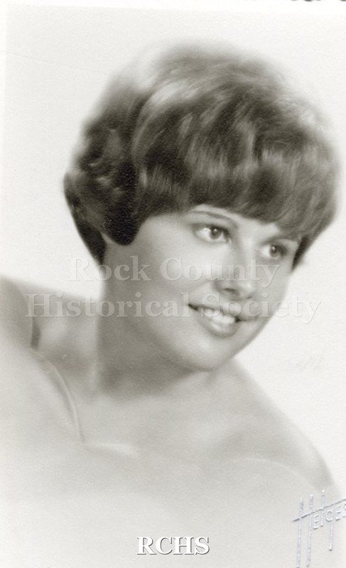 Black and white portrait of an unidentified young woman, Janesville High School graduate. Photo was from the personal collection of Bruce Bell, JHS class of 1965.