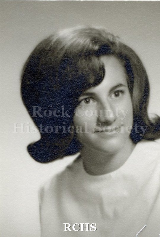 Black and white portrait of an unidentified young woman, Janesville High School graduate. Photo was from the personal collection of Bruce Bell, JHS class of 1965.