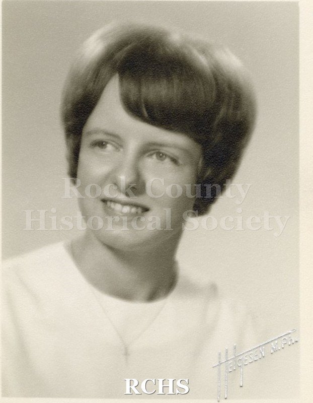 Black and white portrait of an unidentified young woman, Janesville High School graduate. Photo was from the personal collection of Bruce Bell, JHS class of 1965.